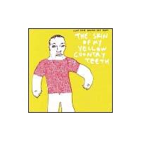 THE SKIN OF MY YELLOW COUNTRY TEETH