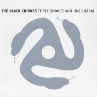 THREE SNAKES AND ONE CHARM